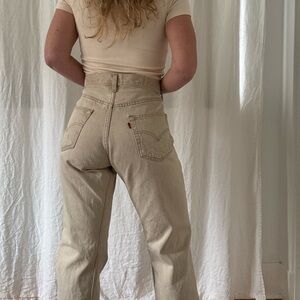 Vintage Levi’s 501 in gold / tan denim classic straight leg five button fly